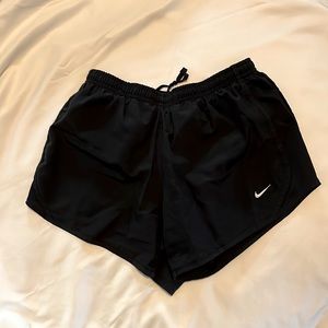 Black Nike running shorts